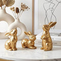 Large Gold Easter Bunny Decor, Set of 3 Geometric Resin Rabbit Figurines (Up to 6.2" Tall) - Modern Spring Table Centerpiece, Animal Statues for Home Office Mantel Shelf & Gift Idea